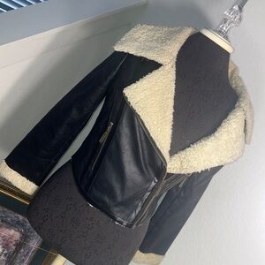 Elegant Black and Cream Shearling Leather Jacket